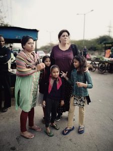 Daphne with children heading for the local market