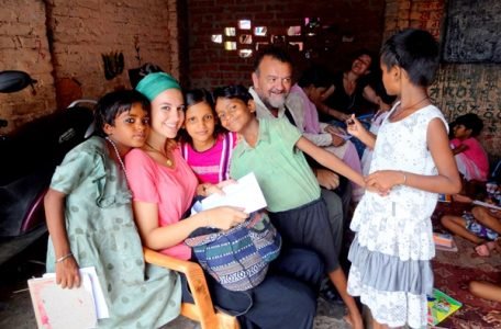 Volunteers with girls at a children’s center