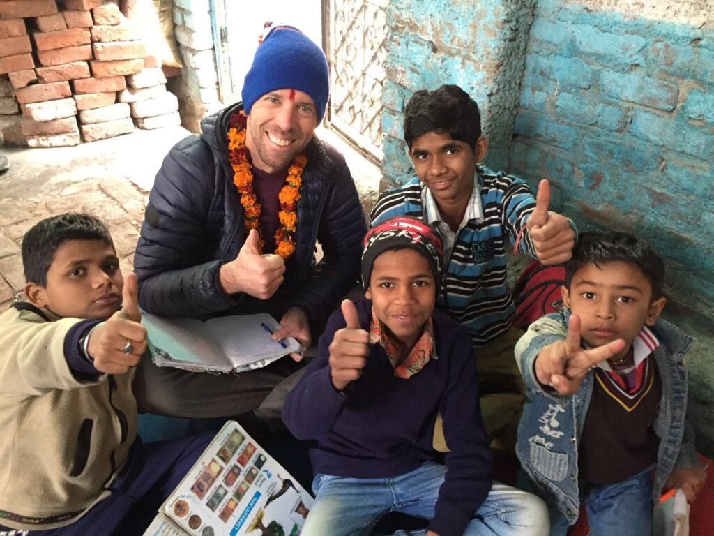 A volunteer with boys at a street children project in Delhi