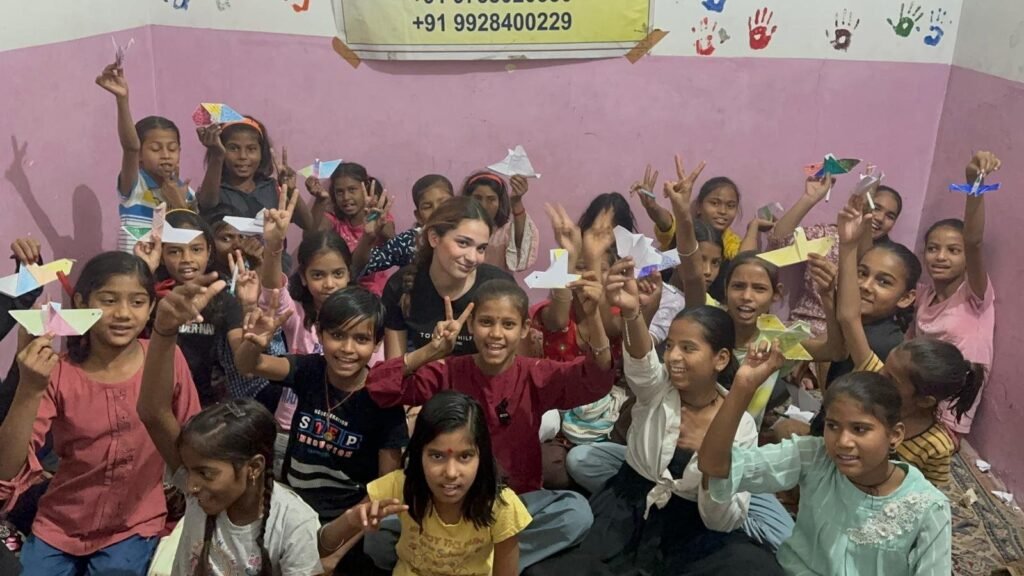 Children and volunteers at a learning center in Jaipur