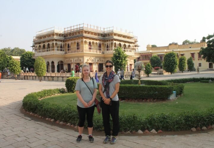 Two volunteers in the gardens of the City Palace in Jaipur