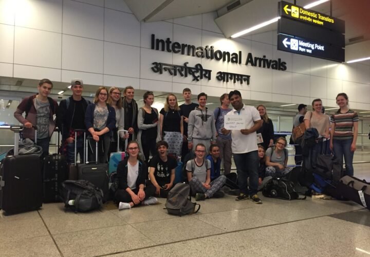 Our coordinator meeting a group of volunteers at Delhi airport arrivals