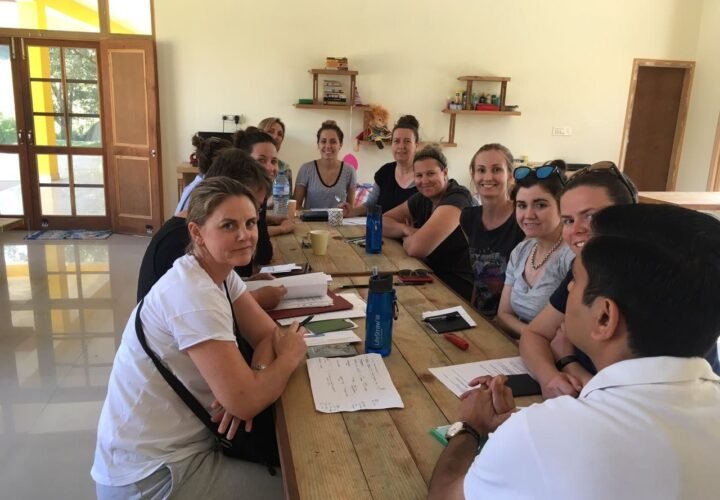 New volunteers at an orientation session with our coordinator in Delhi