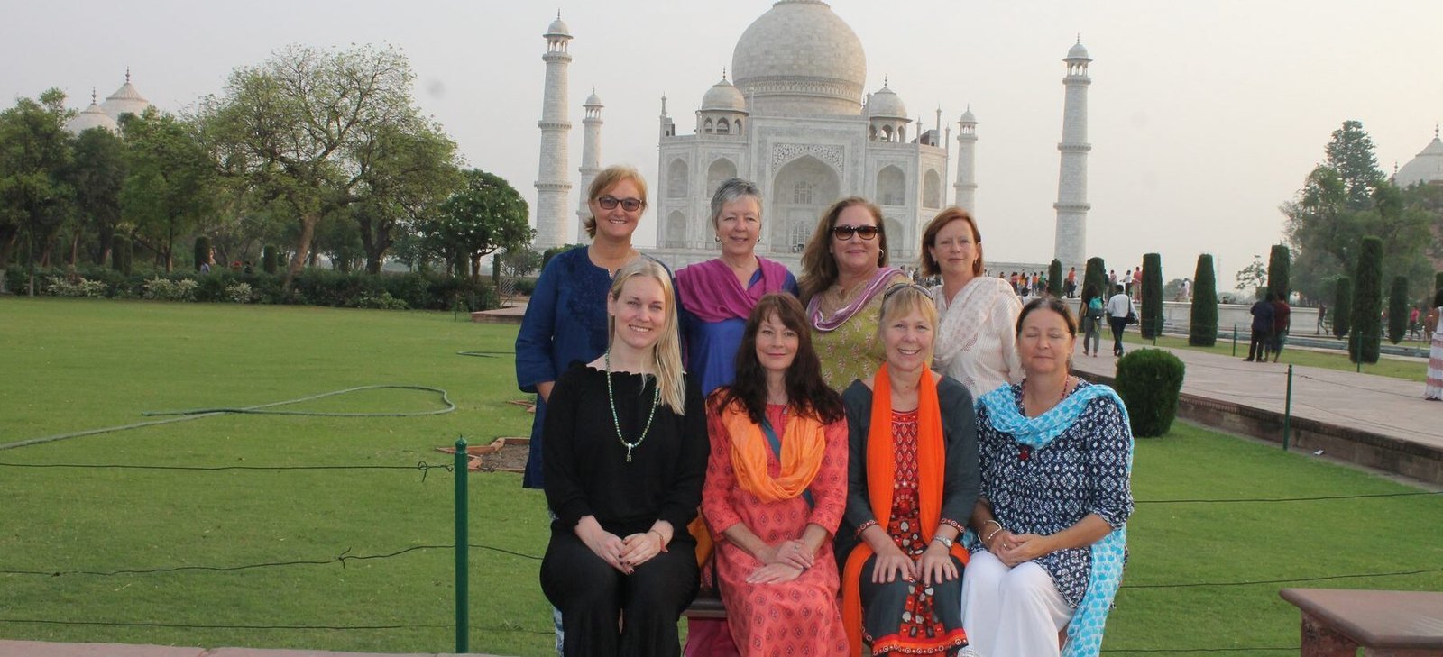 A group of volunteers in front of the Taj Mahal