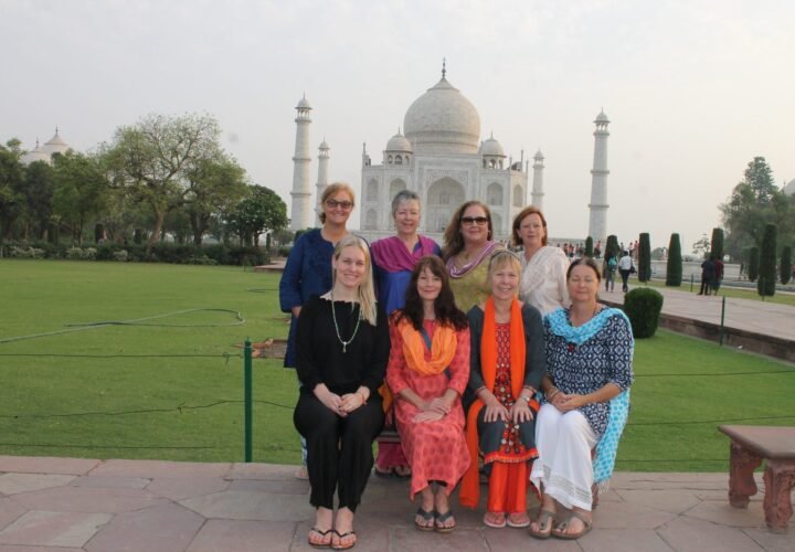 A group of volunteers in front of the Taj Mahal